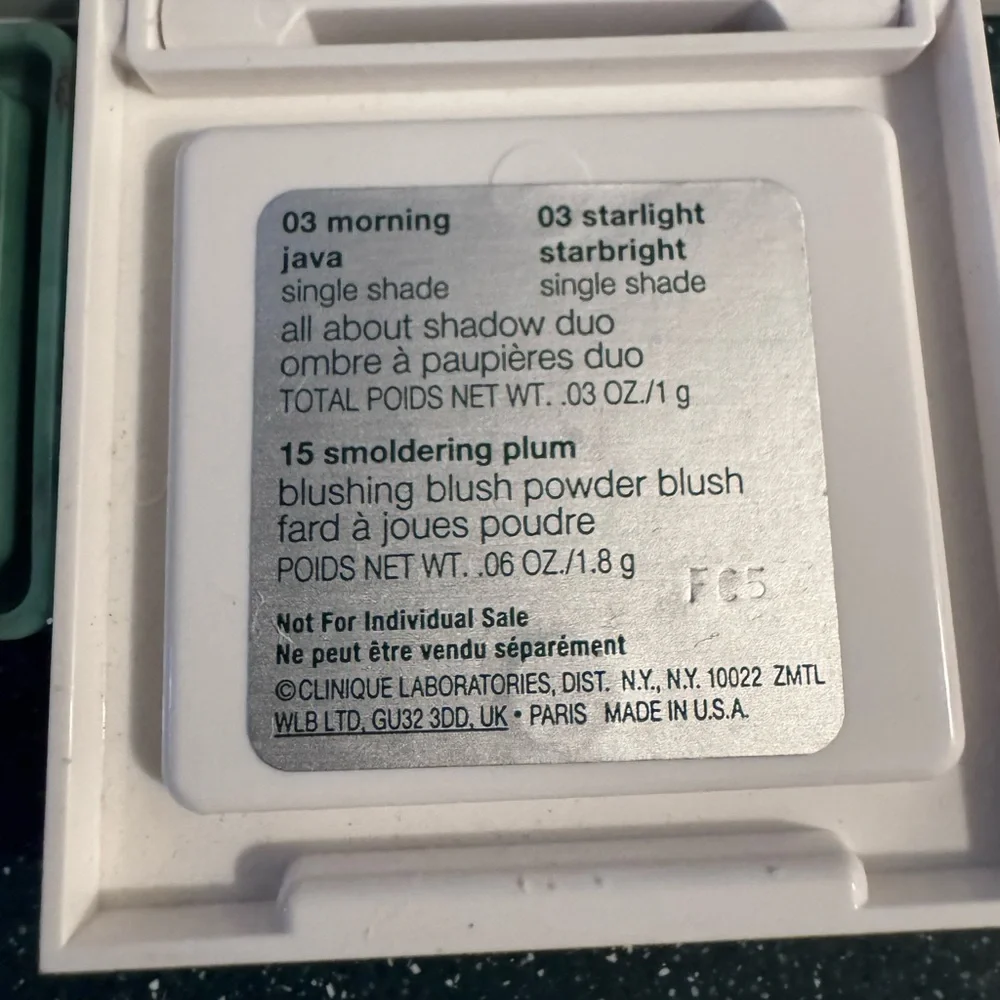 5 Clinique Eyeshadow Palette with Pink, Blue, and Brown Shades